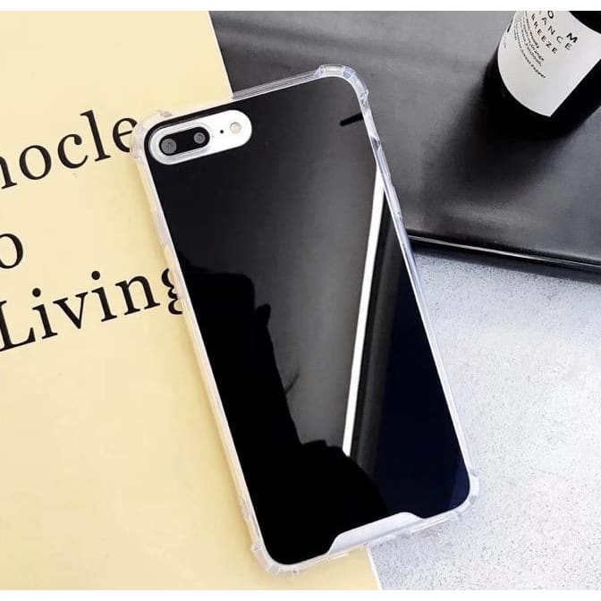 Black mirror silicone case for iPhone 11 by 9eight5, showing a sleek protective cover with reflective finish.