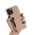 Rose gold silicone phone case for iPhone 11 by 9eight5, snug fit with smooth texture and precise cutouts.