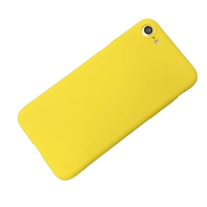 Yellow silicone case for iPhone 6/6s by 9eight5, showing a snug fit and smooth texture on the phone.