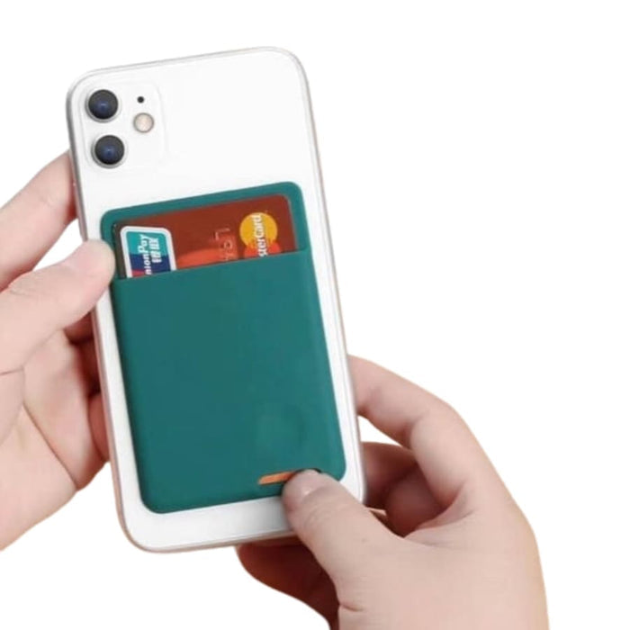 Silicone mobile phone card holder by 9eight5 attached to a phone, featuring slots for cards and a sleek, flexible design.