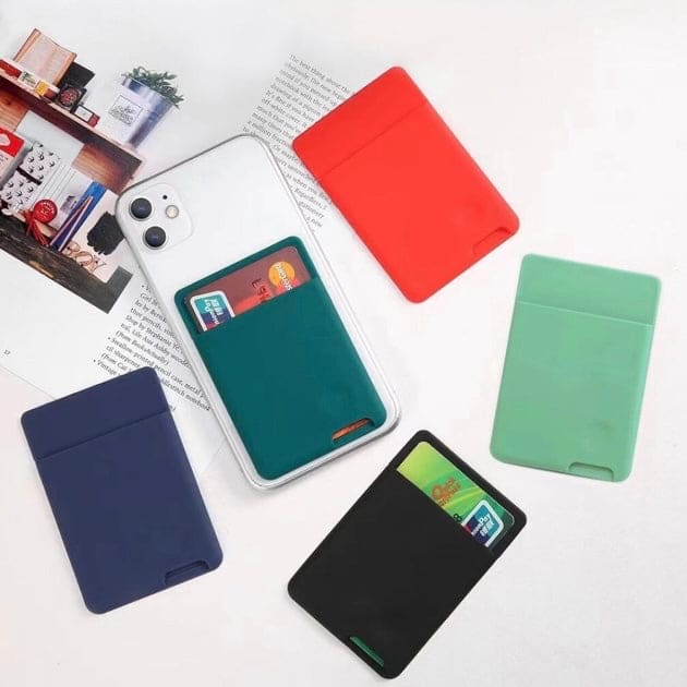 Silicone mobile phone card holder attached to a smartphone, 9eight5 brand, compact and flexible accessory for carrying cards.