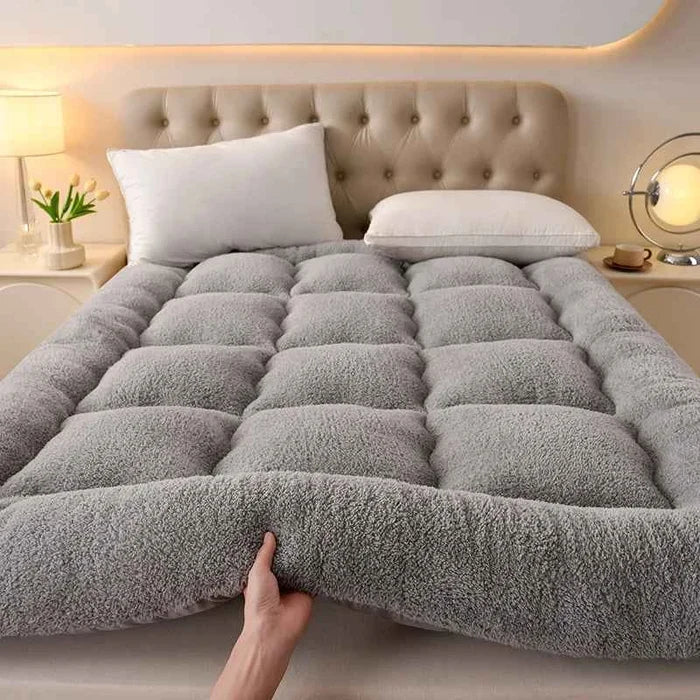 Soft warm autumn winter mattress topper from ShopHub NZ, providing cozy comfort and relaxation for restful sleep.