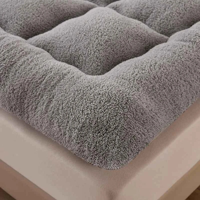 Soft warm autumn winter mattress topper from ShopHub NZ offering cozy comfort and relaxation on a bed.