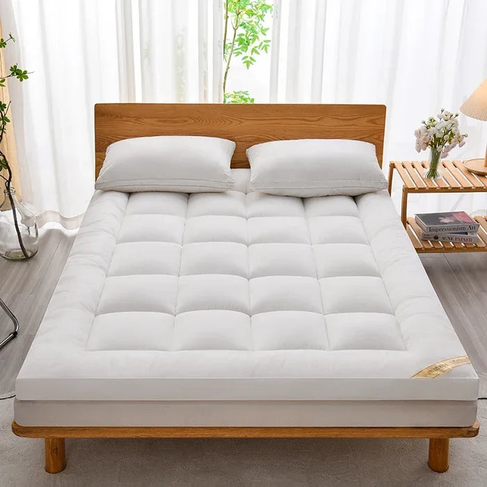 Soft warm autumn winter mattress topper from ShopHub NZ, providing cozy comfort and relaxation for chilly nights.
