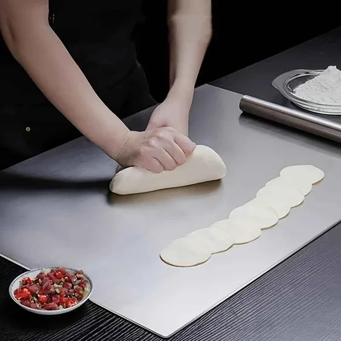 Stainless steel ShopHub NZ chopping board, durable and sleek surface ideal for food prep and cutting tasks.