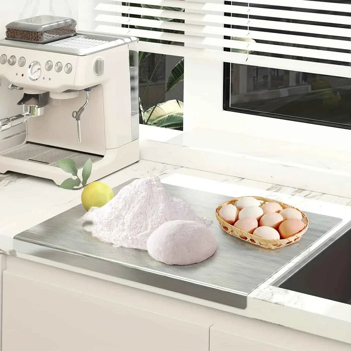 Stainless steel ShopHub NZ chopping board for food prep, with a smooth surface and sturdy design for kitchen use.