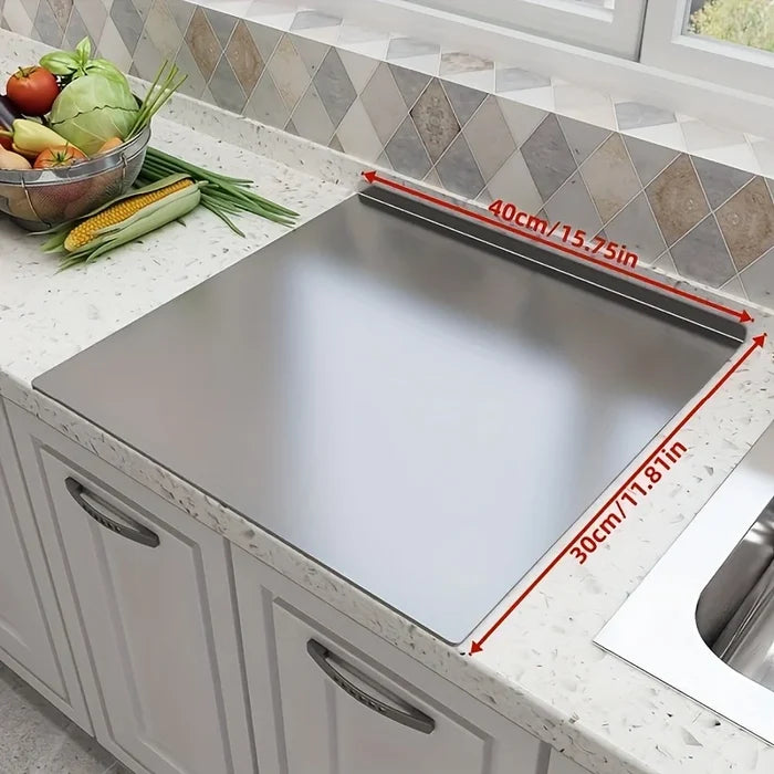 Stainless steel ShopHub NZ chopping board with a smooth, durable surface ideal for food preparation in a modern kitchen.