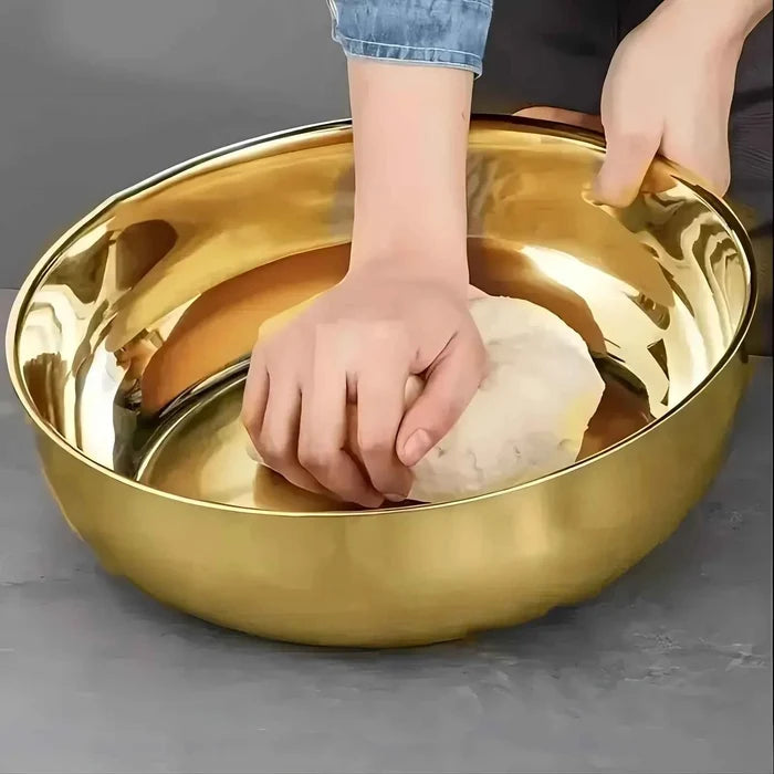 Stainless steel mixing bowl for large capacity and versatile kitchen use, ideal for baking and food prep in a modern kitchen