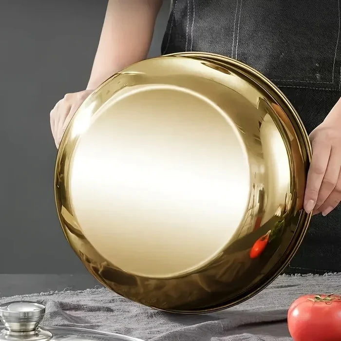 Stainless steel mixing bowl with large capacity, ideal for versatile kitchen tasks, showcasing a shiny, durable finish.