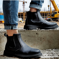 Steel toe slip-on work shoes by dealonline.co.nz, made of oiled leather with puncture-proof sole and soft, lightweight comfort.