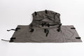 Gray multi-purpose storage bag with adjustable straps and durable fabric for secure organization.
