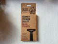 A 100mm quality glass scraper by Two Fussy Blokes, packaged in a cardboard backing with branding and product information.