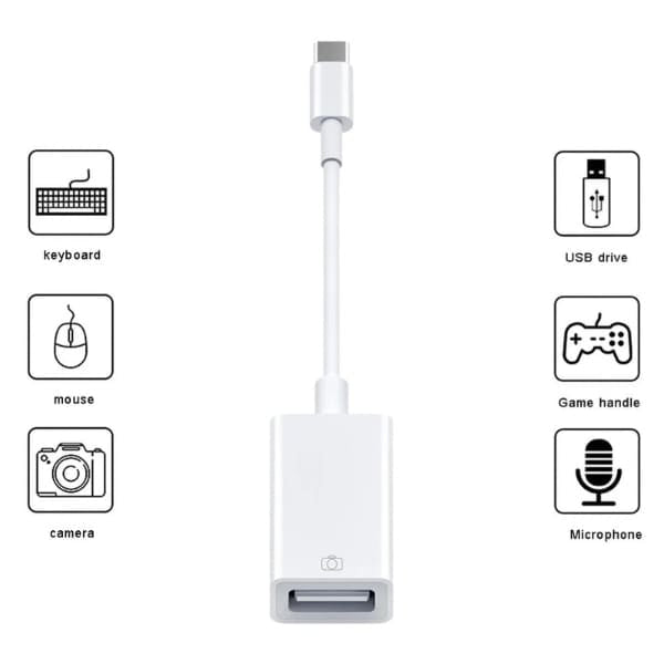 9eight5 Type-C to USB adapter connected to a laptop, showing compact electronic accessory for data transfer and device connectivity.