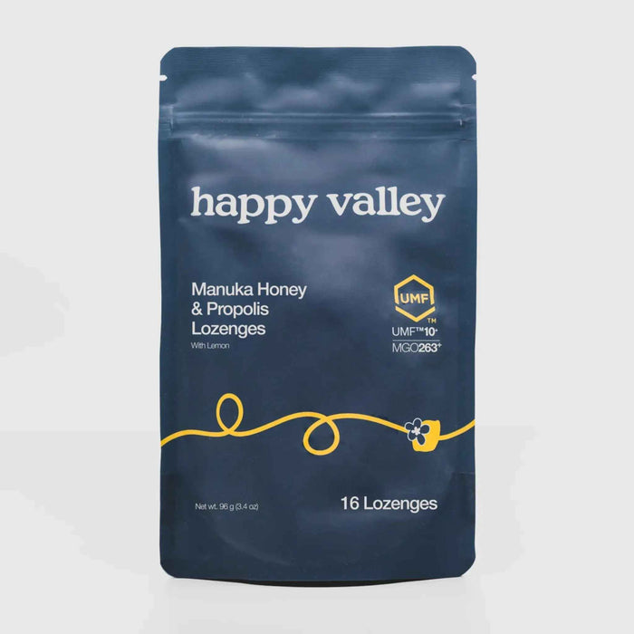 Happy Valley Honey UMF 10+ Manuka Honey and Propolis Lemon Lozenges in a clear blister pack, showing golden lozenges with lemon flavor.