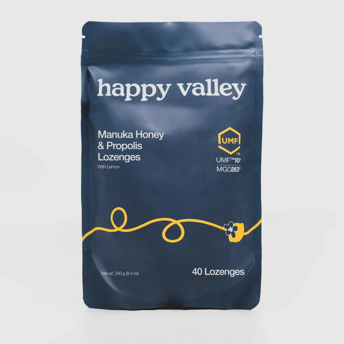 Happy Valley Honey UMF 10+ Manuka Honey and Propolis Lemon Lozenges in a clear package with three lozenges visible.