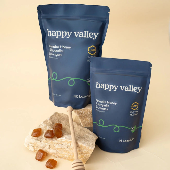 Happy Valley Honey UMF 10+ Manuka Honey and Propolis Lozenges with peppermint flavor, showing the lozenge packaging and branding.