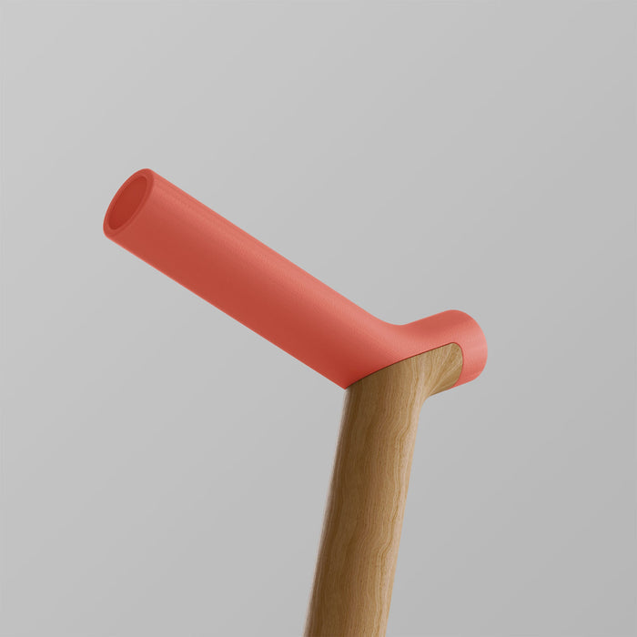 OOAK Uno walking stick with coral handle and oak shaft, featuring ergonomic design and natural wood finish.