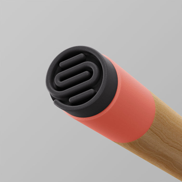 Ooak Uno coral and oak walking stick with a textured coral handle and elegant oak shaft, showcasing craftsmanship and natural materials.