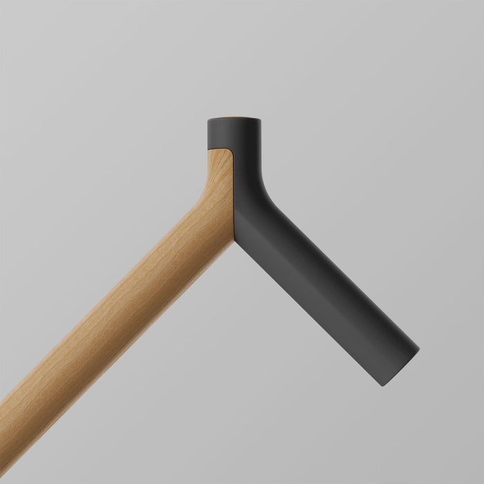 OOAK Uno walking stick with a graphite and oak handle featuring a triangular design, crafted for stylish support and durability.
