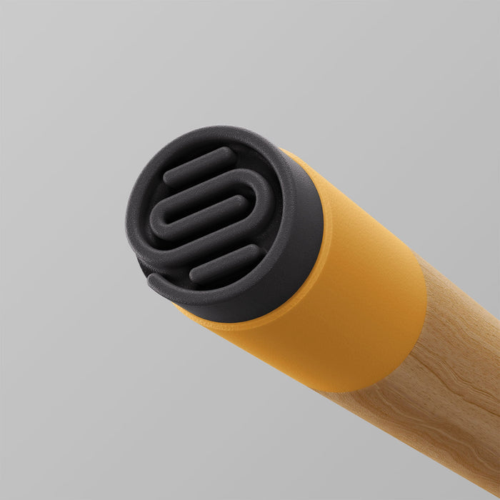 Ooak Uno walking stick featuring a Kōwhai and oak wood handle with a carved foot design.