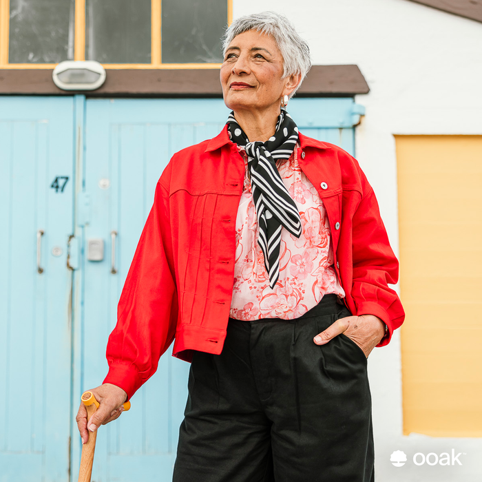 Ooak Kōwhai and Oak walking stick with yellow boat shed door design, featuring natural wood textures and vibrant yellow highlights.