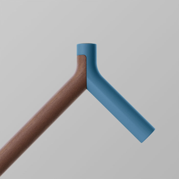 OOAK Uno walking stick with walnut handle and Pacific-colored shaft, featuring a triangular design and ergonomic grip.