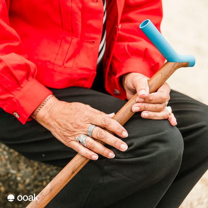 Ooak Uno walking stick with Pacific and Walnut wood, featuring a sleek design and comfortable handle.