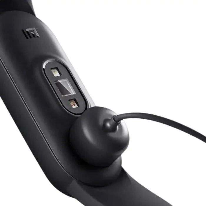 Magnetic USB charger for Xiaomi Mi Band 7 Pro and Series 2-7, designed by Habicare for easy charging of TWS fitness bands.