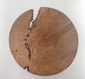 Wooden plate  with natural grain and texture on a white background