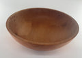 Wooden bowl on a white background
