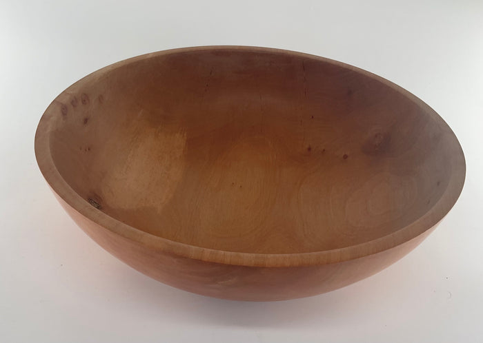 Wooden bowl on a white background