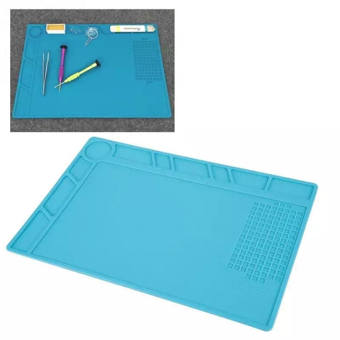That Watch Shop watch repair mat with watch tools for electronics repair, featuring organized compartments and a non-slip surface.