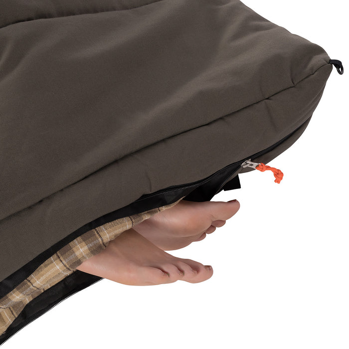 Cozy brown sleeping bag with a plaid lining and zippered closure, perfect for camping or outdoor adventures.