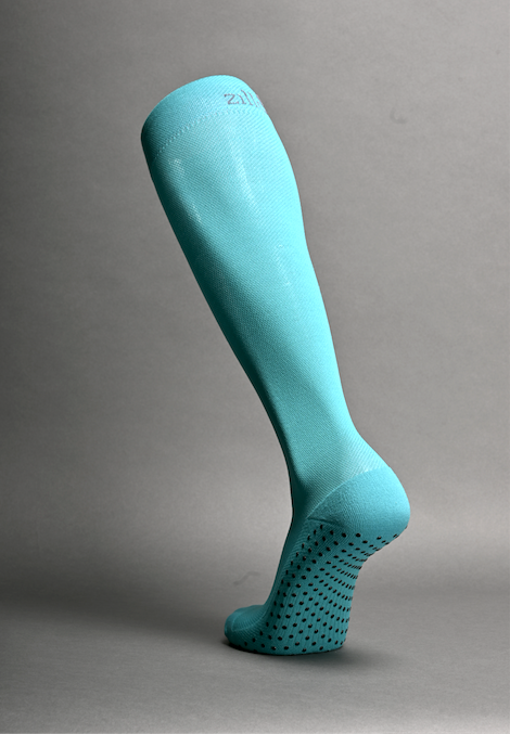 ZilloPillow Zillo Explorer travel compression sock in gray, featuring supportive design for comfort during travel.