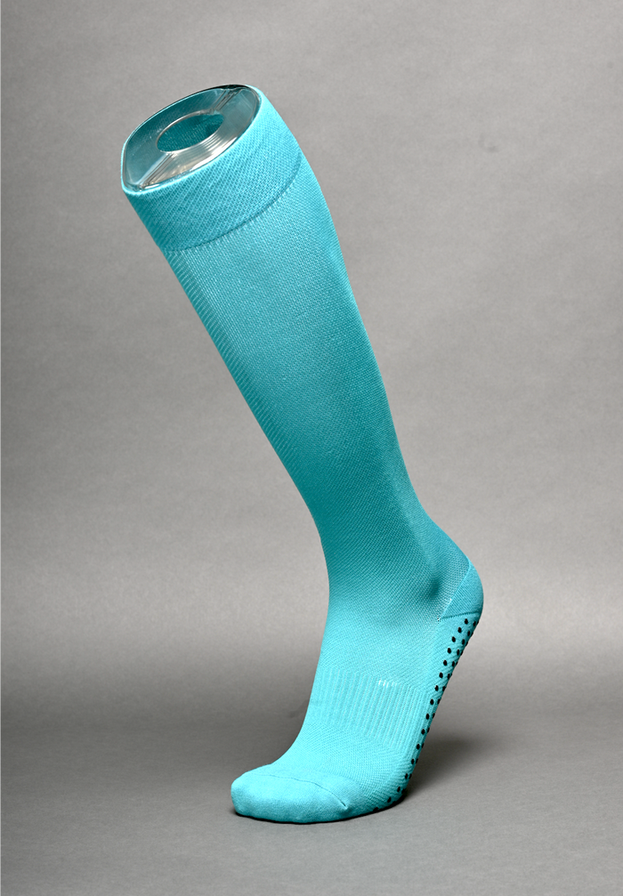 Zillo Explorer travel compression sock by ZilloPillow, showing a close-up of the blue and gray compression sock designed for travel comfort.
